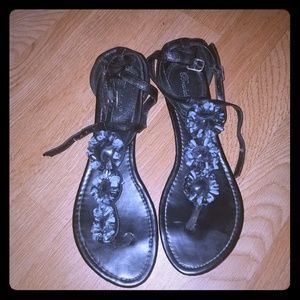 Black flat sandals with low wedge